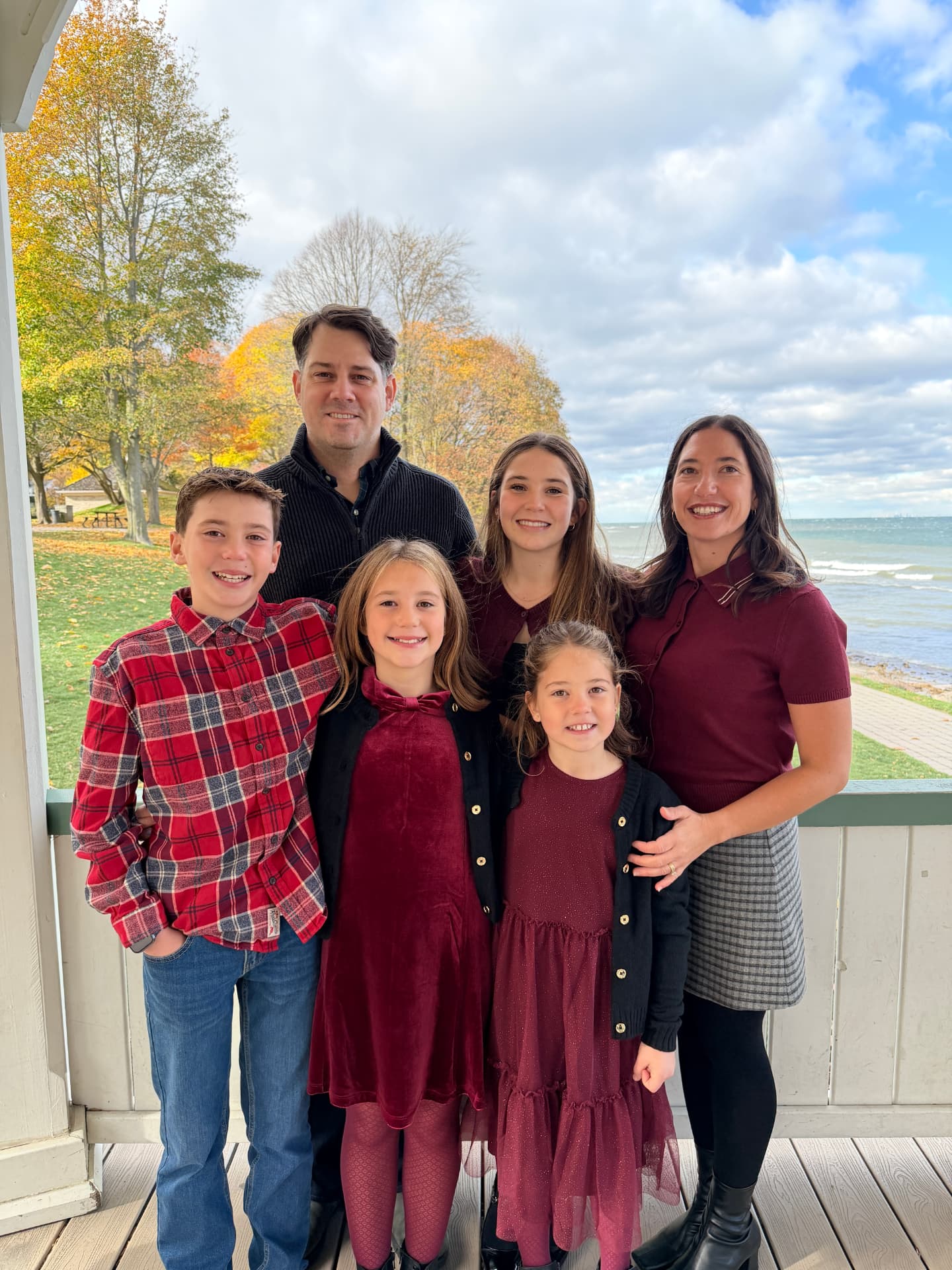 Adriana Cater Vizzari with her family outdoors by the lake